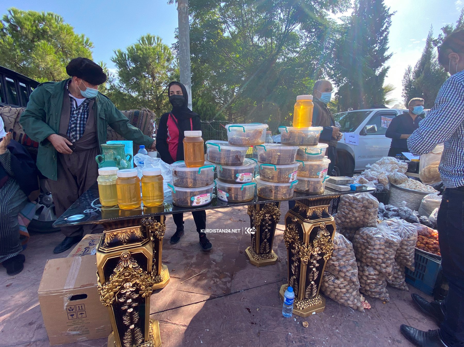 Walnts, honey, and other dried food, all locally produced, are displayed for sale, Nov. 15, 2020. (Photo: Kurdistan 24/Renas Ali)
